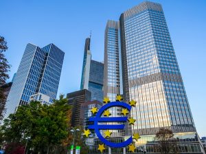 Frankfurt skyscrapers with large Euro sign in front