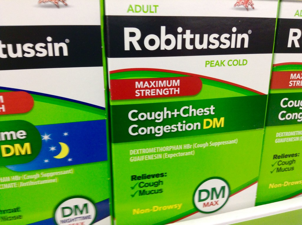 "Robitussin Cough Cold Flu Congestion decongestant Relief Medicine" by Mike Mozart is licensed under CC BY 2.0 Photo showing various packages of Robitussin medications