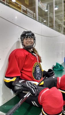 Woman playing ice hockey